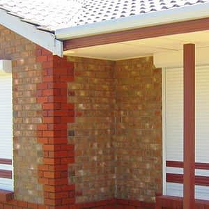 Brown Brick Structure with White Roller Shutters - Aus-Secure